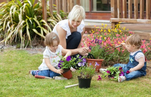 Front garden landscaping in Beddington with neat borders and pathways